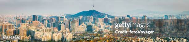 seoul crowded skyscraper cityscape downtown namsan tower sunset panorama korea - n seoul tower stock pictures, royalty-free photos & images