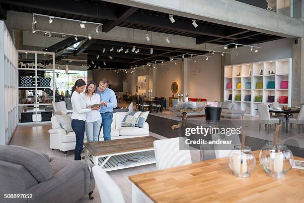 couple shopping at a furniture store - furniture imagens e fotografias de stock