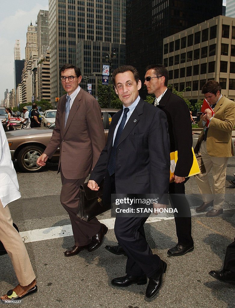 Nicolas Sarkozy (C), Finance Minister of