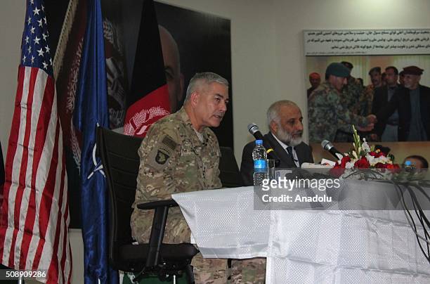 Afghan acting Defense Minister Masoom Stanekzai and Commander of U.S and NATO forces in Afghanistan, General John F. Campbell speak during a press...
