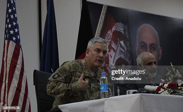 Afghan acting Defense Minister Masoom Stanekzai and Commander of U.S and NATO forces in Afghanistan, General John F. Campbell speak during a press...