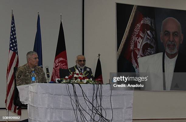 Afghan acting Defense Minister Masoom Stanekzai and Commander of U.S and NATO forces in Afghanistan, General John F. Campbell speak during a press...