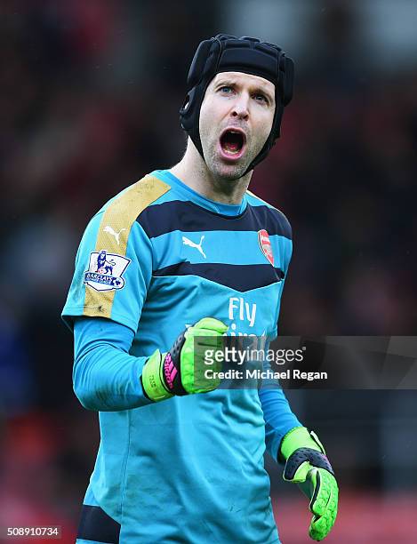 Petr Cech of Arsenal celebrates victory after the Barclays Premier League match between A.F.C. Bournemouth and Arsenal at the Vitality Stadium on...