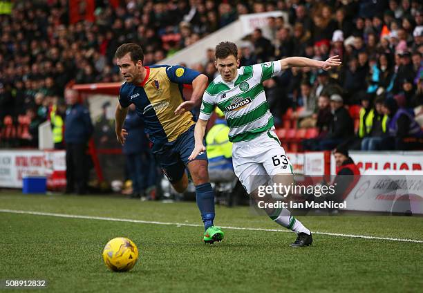 Gavin Lachlan of East Kilbride vies with Kieran Tierney of Celtic during the William Hill Scottish Cup Fifth Round match between East Kilbride and...