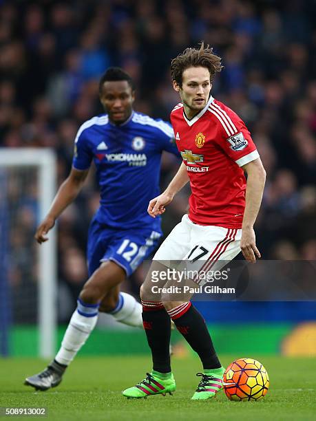 Daley Blind of Manchester United is closed down by John Mikel Obi of Chelsea during the Barclays Premier League match between Chelsea and Manchester...