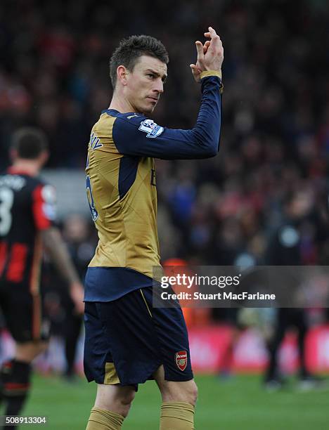 Laurent Koscielny applauds the Arsenal fans after the Barclays Premier League match between AFC Bournemouth and Arsenal at The Vitality Stadium on...