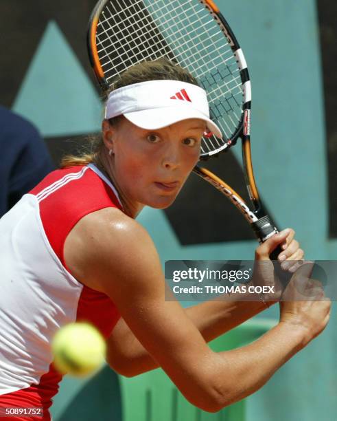 Russian Dinara Safina hits a shot to German Julia Schruff in the first round of their singles match during the French Open tennis tournament at...