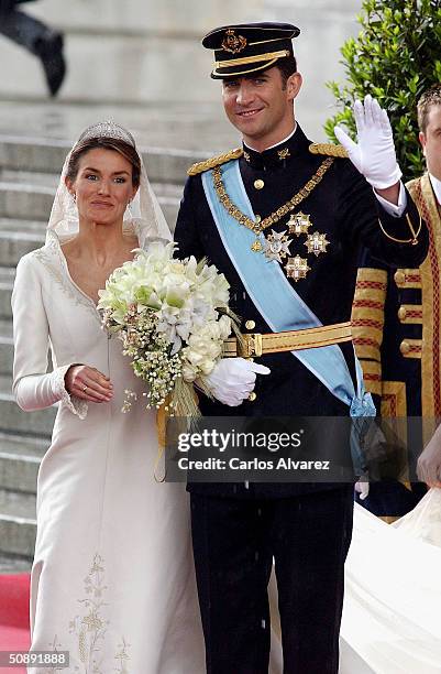 Spanish Crown Prince Felipe de Bourbon and his bride, princess Letizia Ortiz leave the Almudena cathedral after their wedding ceremony May 22, 2004...