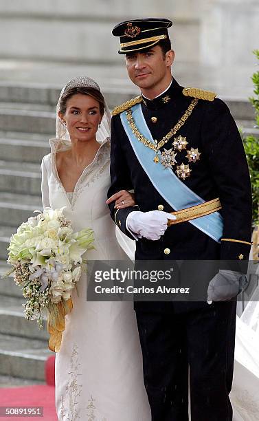 Spanish Crown Prince Felipe de Bourbon and his bride, princess Letizia Ortiz leave the Almudena cathedral after their wedding ceremony May 22, 2004...