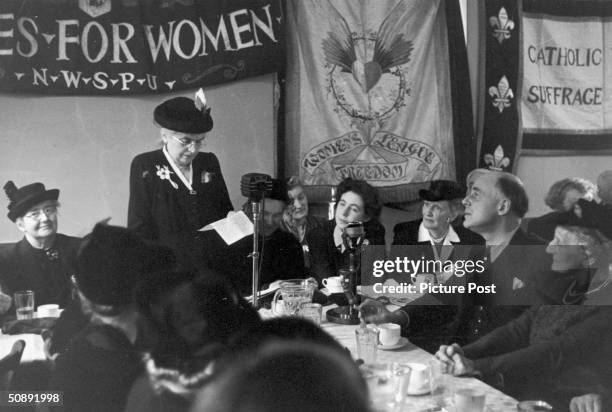 Eleanor Rathbone , a former campaigner for women's suffrage, celebrates the Silver Jubilee of the Women's Vote in London, 20th February 1943. Banners...