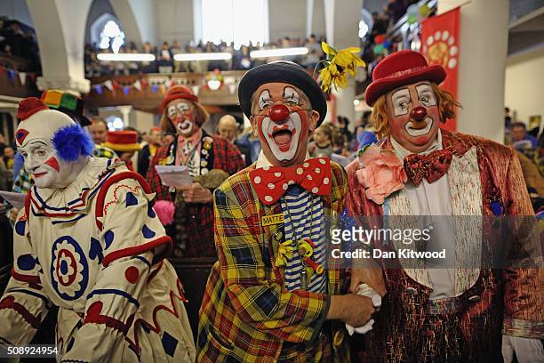 Clowns attend the 70th anniversary Clown Church Service at All Saints Church in Haggerston on February 7, 2016 in London, England. Clowns attended...