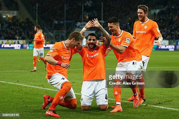 Aytac Sulu of Darmstadt celebrates his team's first goal with team mates during the Bundesliga match between 1899 Hoffenheim and SV Darmstadt 98 at...