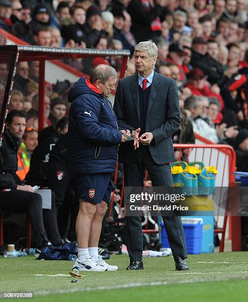 Arsene Wenger the Arsenal Manager with kit man Vic Akers during the Barclays Premier League match between AFC Bournemouth and Arsenal at The Vitality...