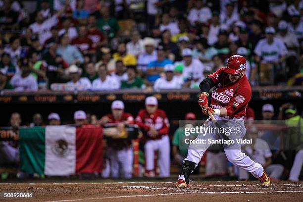 Jesus Esteban Quiroz of Venados de Mazatlan hits the ball during a semifinal match between Ciego de Avila from Cuba and Venados de Mazatlán from...