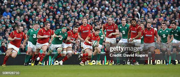 Lloyd Williams of Wales makes a break during the RBS Six Nations match between Ireland and Wales at the Aviva Stadium on February 7, 2016 in Dublin,...