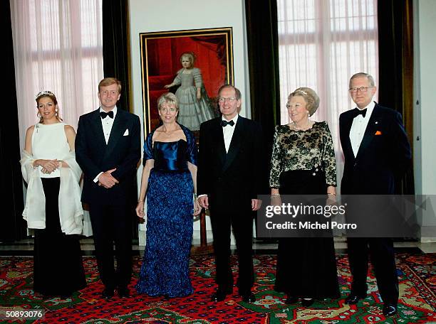 Dutch Princess Maxima, Crown Prince Willem Alexander, President Joseph Deiss with his wife, Dutch Queen Beatrix and Pieter van Vollenhoven smile...