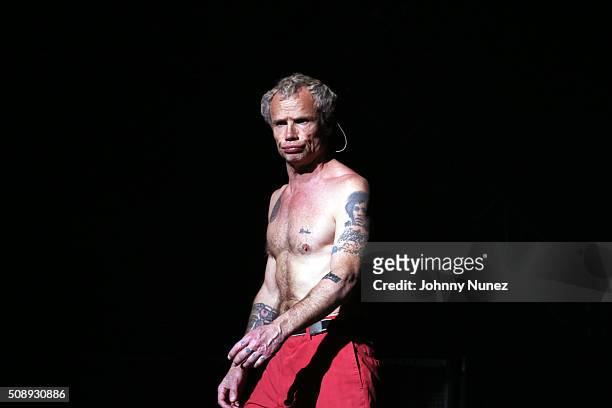 Guitarist Flea of Red Hot Chili Peppers performs at DIRECTV's Super Saturday Night Featuring Red Hot Chili Peppers Co-hosted By Mark Cuban's AXS TV...