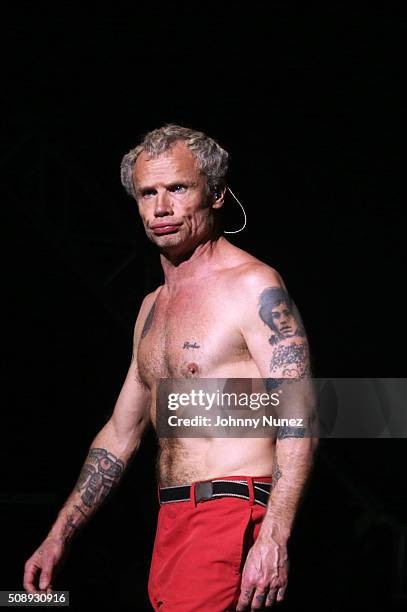 Guitarist Flea of Red Hot Chili Peppers performs at DIRECTV's Super Saturday Night Featuring Red Hot Chili Peppers Co-hosted By Mark Cuban's AXS TV...