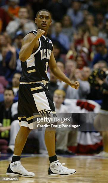 Justin Gray of the Wake Forest Demon Deacons celebrates on the court during their third round game of the NCAA Division I Men's Basketball Tournament...