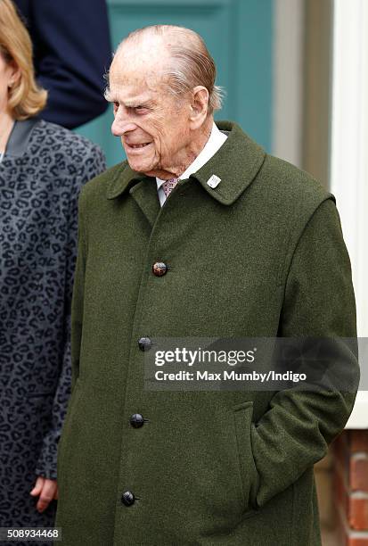 Prince Philip, Duke of Edinburgh departs after attending Sunday service at the Church of St Peter & St Paul, West Newton on February 7, 2016 in...