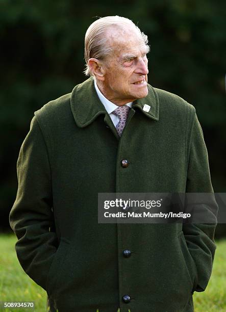 Prince Philip, Duke of Edinburgh departs after attending Sunday service at the Church of St Peter & St Paul, West Newton on February 7, 2016 in...