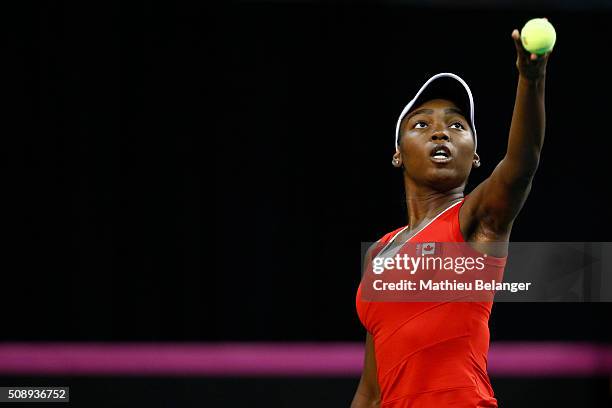 Francoise Abanda of Canada serves to Olga Govortsova of Belarus during their Fed Cup BNP Paribas match at Laval University in Quebec City on February...