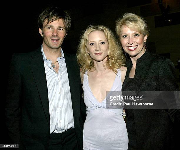 Actress Anne Heche with her husband Coley Laffoon and actress Julie Halston attend Show People Magazine Celebrates the 2003-2004 Tony Awards party at...