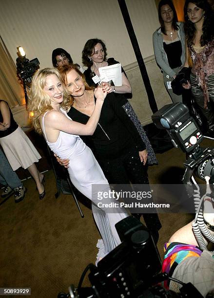 Actress Anne Heche and Swoosie Kurtz pose for photographers as they attend Show People Magazine Celebrates the 2003-2004 Tony Awards party at Gotham...