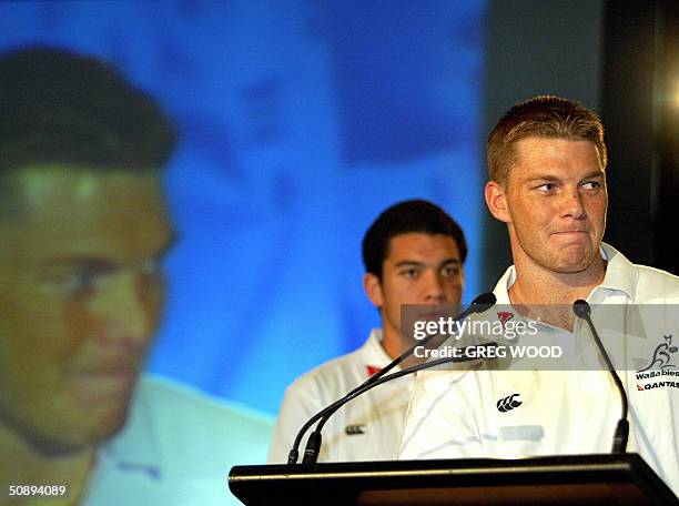 Australian Wallabies rugby union test newcomers Clyde Rathbone and Mark Gerrard speak at a team announcement at Sydney's Luna Park, 25 May 2004. The...