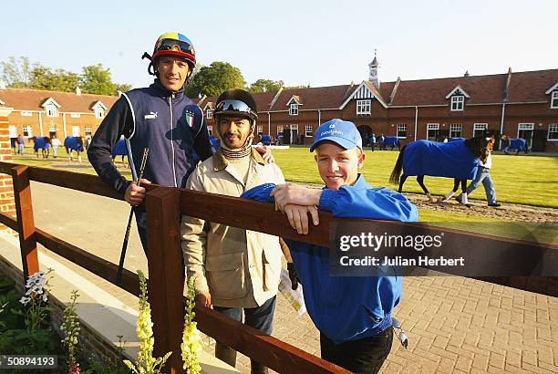Godolphin jockies Fankie Dettori and Kerrin McEvoy with trainer Saeed Bin Suroor after their horses worked on the gallops at Newmarket, on May 25,...