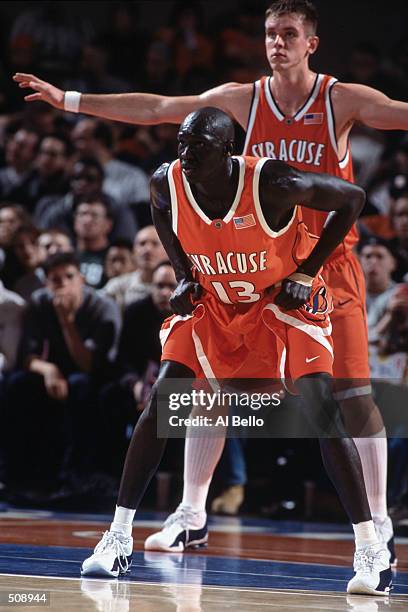 Kueth Duany of the Syracuse Orangeman gets ready to guard the basket with Craig Forth during the game against the Wake Forest Demons Deacons at...