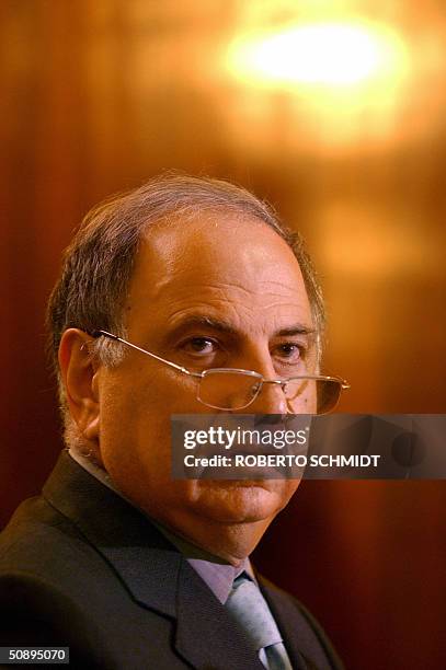 Iraqi Governing Council member Ahmed Chalabi, who has recently fallen out with the US-led coalition, speaks to the press at his home in Baghdad 25...