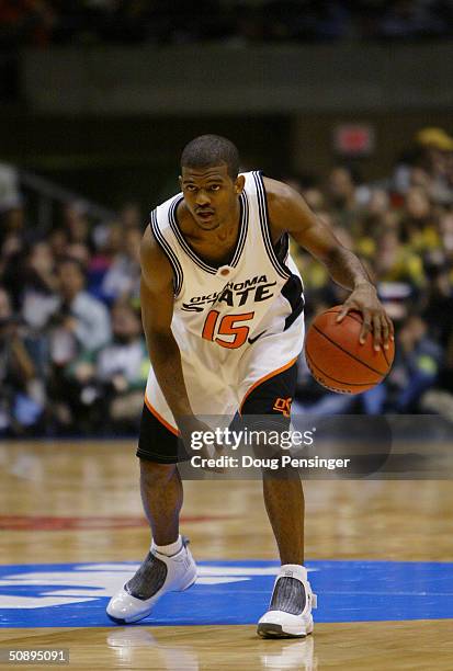 John Lucas of Oklahoma State University Cowboys moves the ball during the third round game of the NCAA Division I Men's Basketball Tournament against...