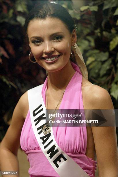 Miss Ukraine Oleksandra Nikolayenko poses at photographers during an interview with media in Quito 25 May 2004. The Miss Universe 2004 contest will...