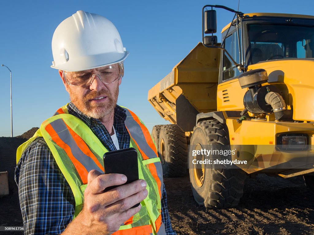 Construction Engineer, Truck and Smart Phone