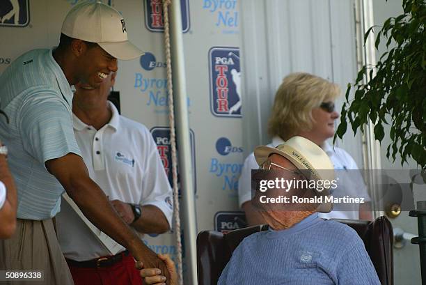 Tiger Woods greets Byron Nelson during the third round of the EDS Byron Nelson Championship on May 15, 2004 at the TPC Las Colinas in Irving, Texas.