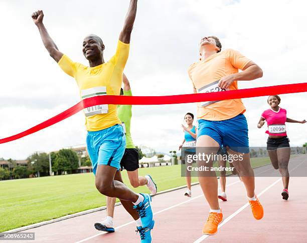 group of people in a marathon - man arms crossed stock pictures, royalty-free photos & images