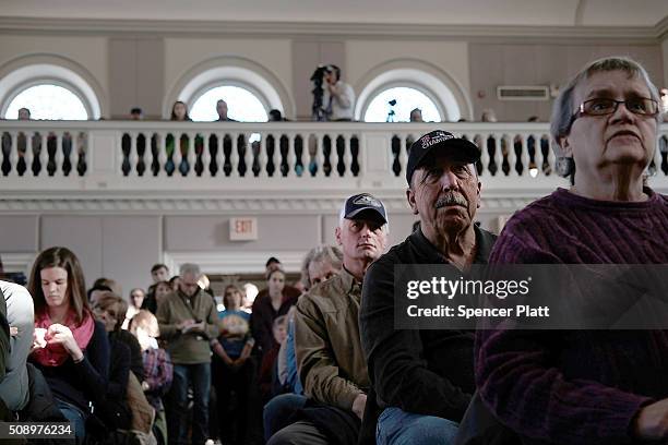 People listen as Republican presidential candidate Sen. Ted Cruz speaks at a Town Hall event on February 7, 2016 in Peterborough, New Hampshire....