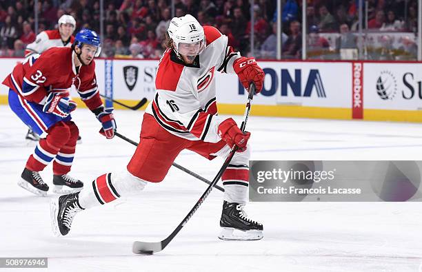 Elias Lindholm of the Carolina Hurricanes fires a slap shot against the Montreal Canadiens in the NHL game at the Bell Centre on February 7, 2016 in...