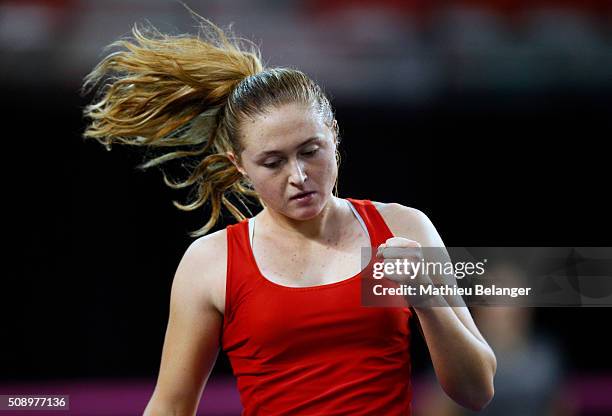 Aliaksandra Sasnovich of Belarus reacts after winning a poitn against Aleksandra Wozniak of Canada during their Fed Cup BNP Paribas match at Laval...