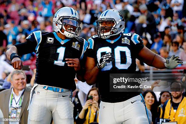 Cam Newton of the Carolina Panthers and Daryl Williams react prior to Super Bowl 50 against the Denver Broncos at Levi's Stadium on February 7, 2016...