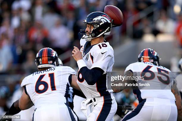 Peyton Manning of the Denver Broncos throws a pass in the first quarter against the Carolina Panthers during Super Bowl 50 at Levi's Stadium on...