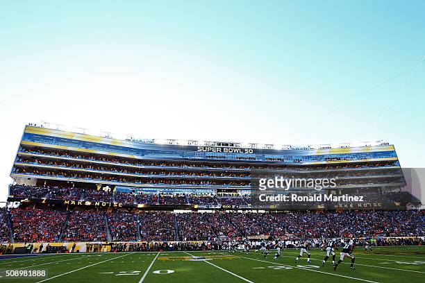 The Carolina Panthers kick the ball to start the game against the Denver Broncos during Super Bowl 50 at Levi's Stadium on February 7, 2016 in Santa...