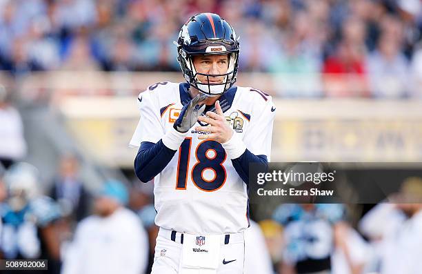 Peyton Manning of the Denver Broncos gestures in the first quarter against the Carolina Panthers during Super Bowl 50 at Levi's Stadium on February...