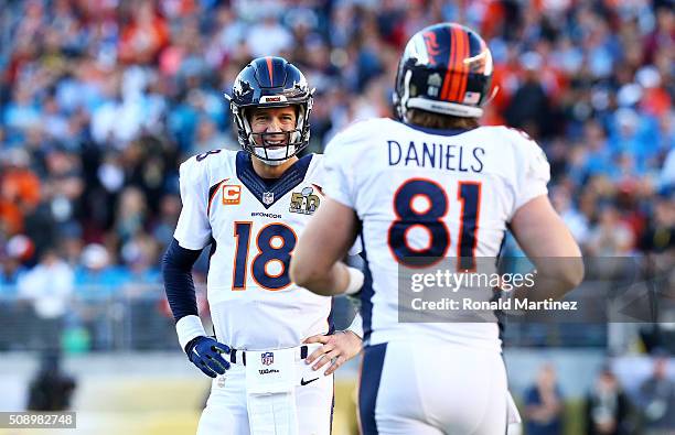 Peyton Manning of the Denver Broncos stands on the field with Owen Daniels of the Denver Broncos in the first quarter during Super Bowl 50 at Levi's...