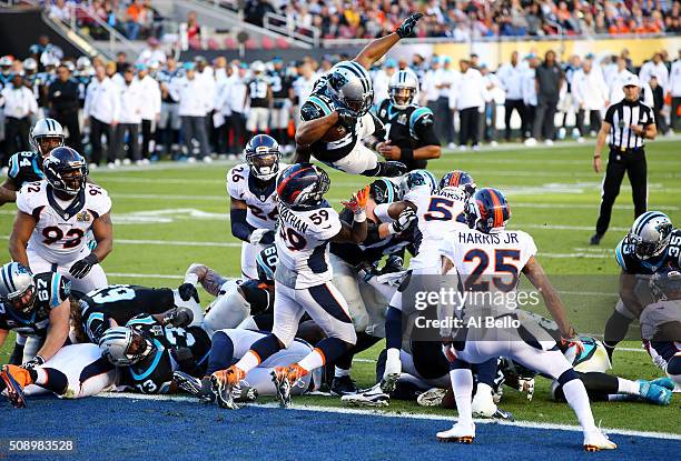 Jonathan Stewart of the Carolina Panthers scores a touchdown against the Denver Broncos in the second quarter during Super Bowl 50 at Levi's Stadium...