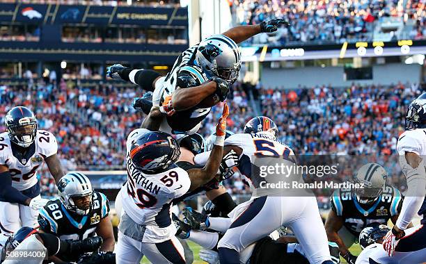 Jonathan Stewart of the Carolina Panthers scores a touchdown against the Denver Broncos in the second quarter during Super Bowl 50 at Levi's Stadium...