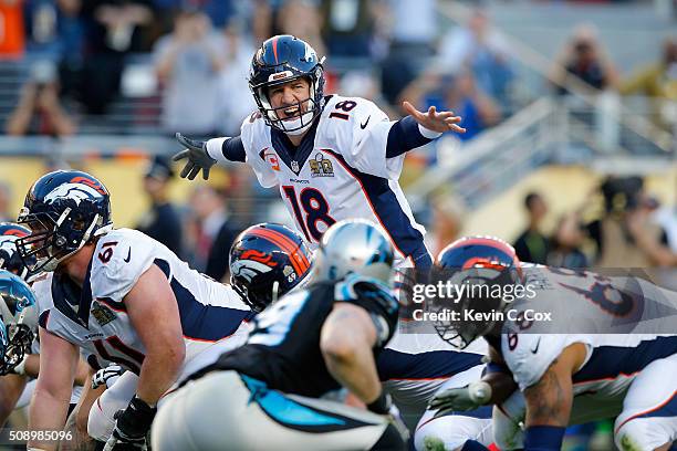Peyton Manning of the Denver Broncos signals to his teammates during Super Bowl 50 against the Carolina Panthers at Levi's Stadium on February 7,...