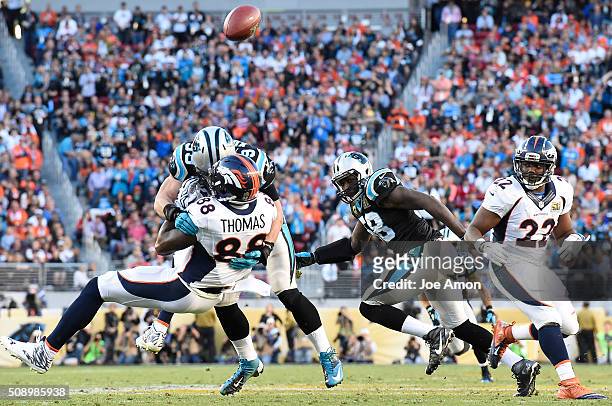 Luke Kuechly of the Carolina Panthers slams Demaryius Thomas of the Denver Broncos to the ground on an incomplete pass in the second quarter. The...