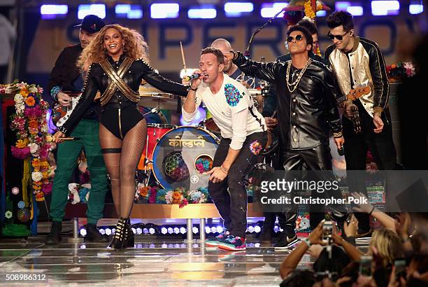 Jonny Buckland of Coldplay, Beyonce, Chris Martin of Coldplay, Bruno Mars and Mark Ronson perform onstage during the Pepsi Super Bowl 50 Halftime...
